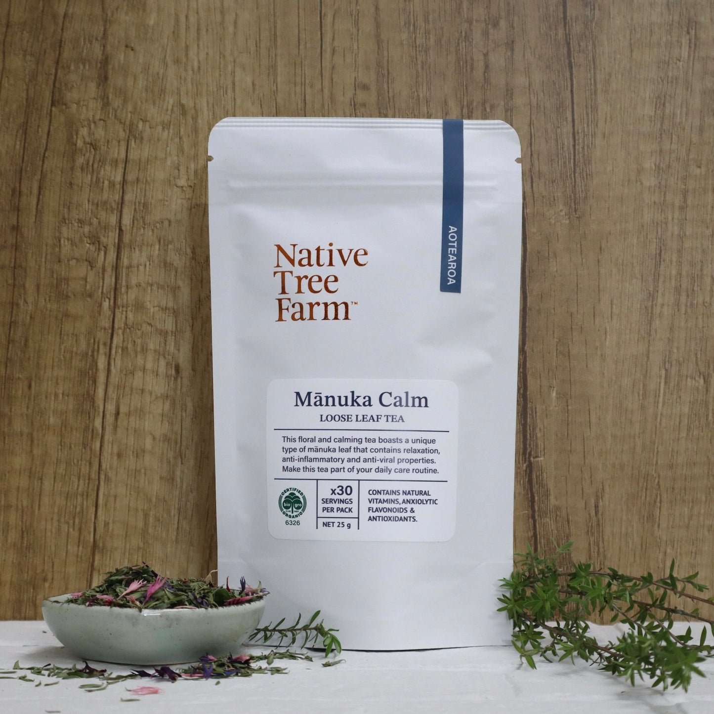 Bag of Native Tree Farm Manuka Calm loose leaf tea on a wooden background