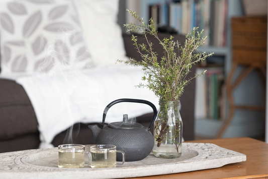 Mānuka tea from Native Tree Farm, brewing on a coffee table
