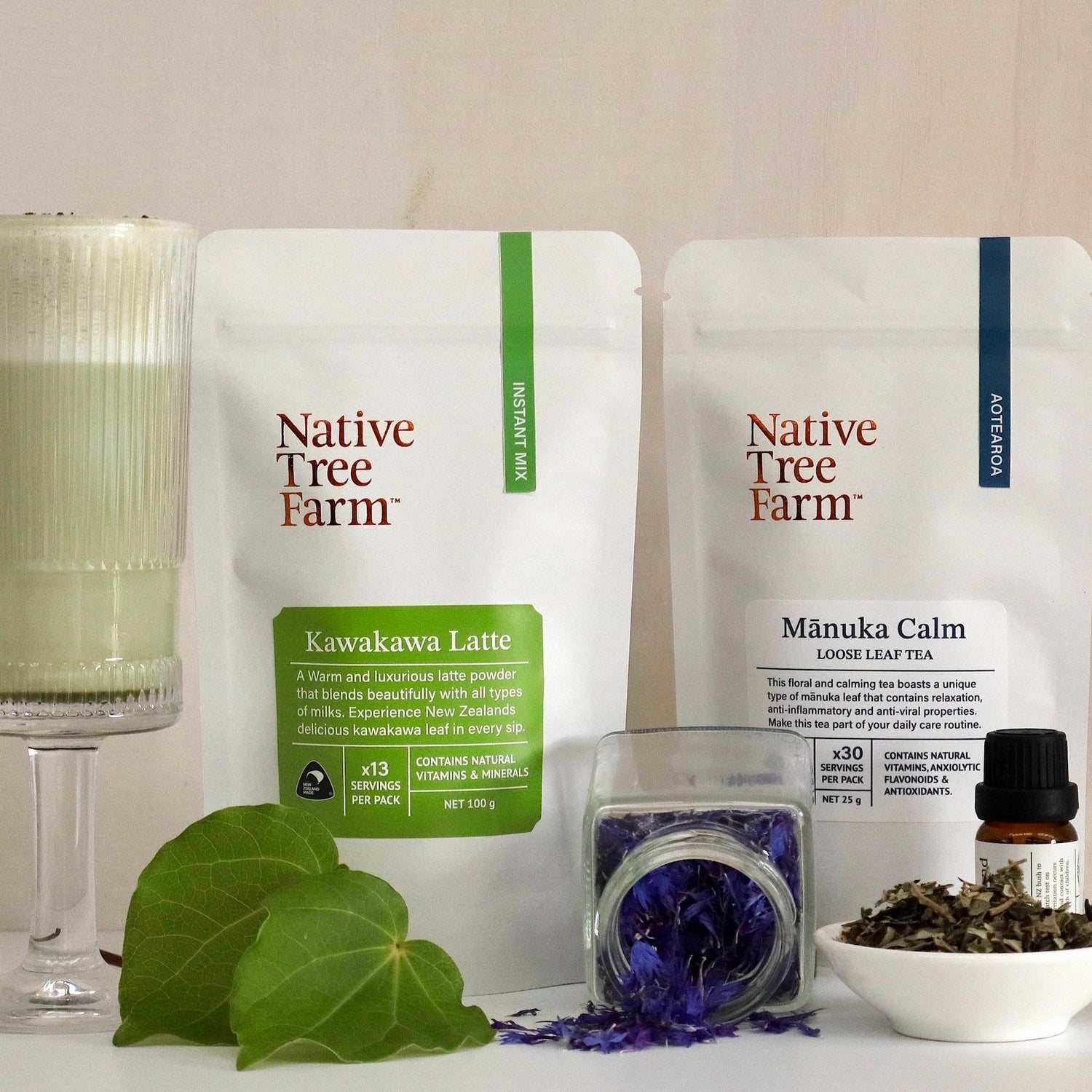 a collection of native tree farm products sitting on a white table
