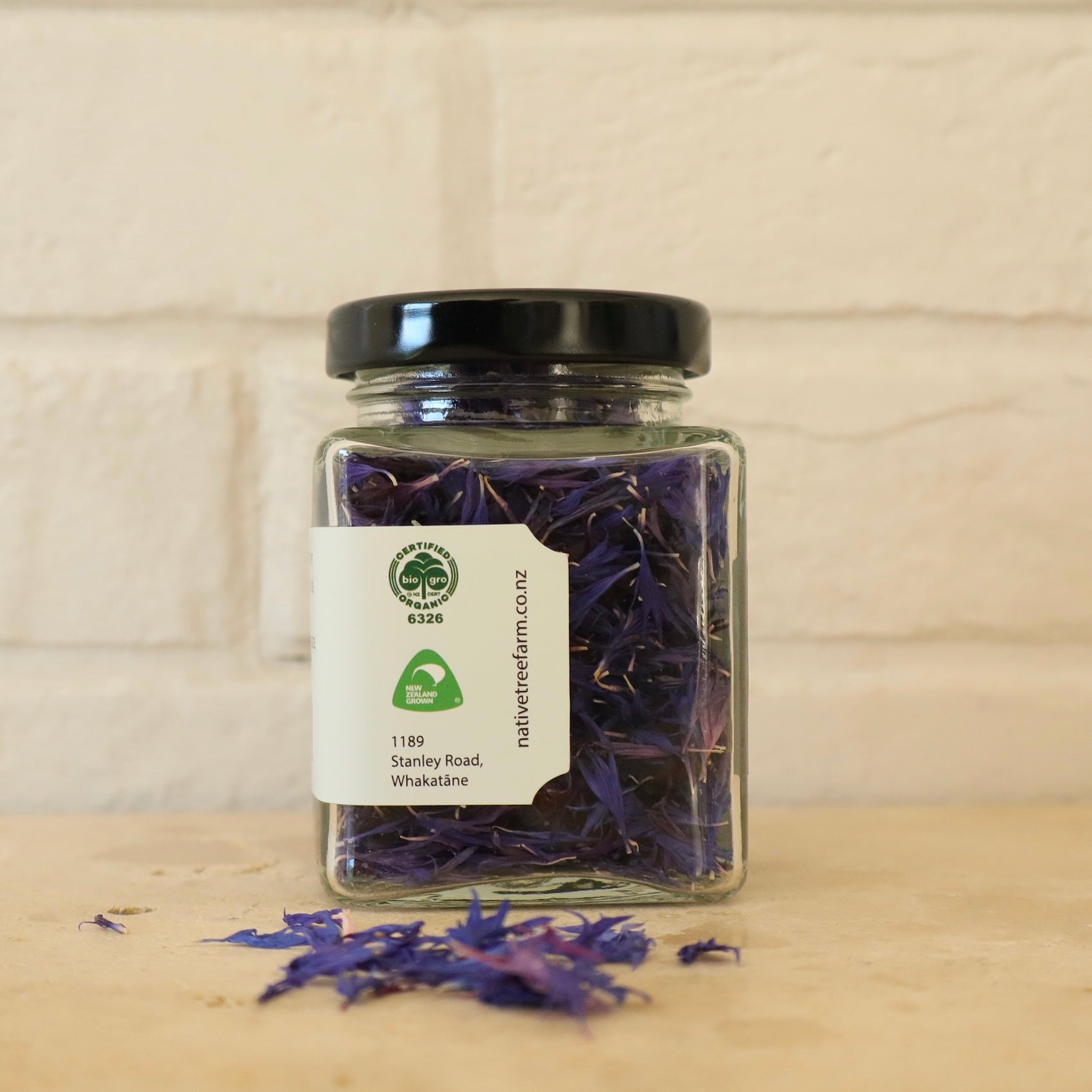 Jar of edible flower petals from Native Tree Farm