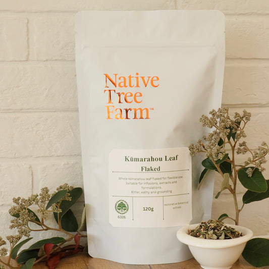 Native Tree Farm Kumarahou Leaf Flaked sitting on a kitchen bench with a white brick background