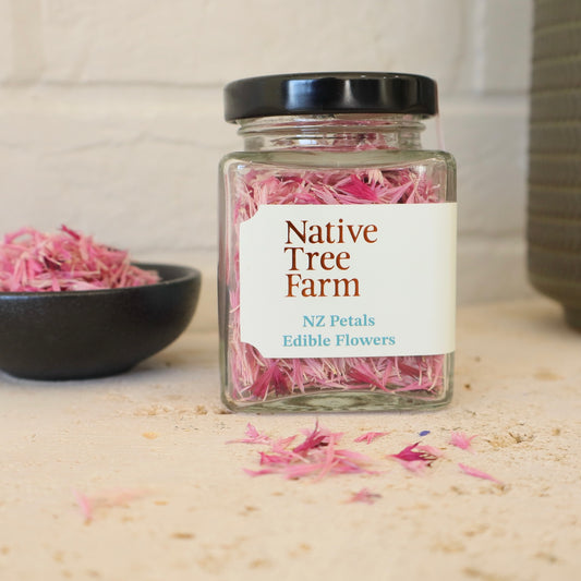 Native Tree Farm pink edible flower petals in a jar on the bench