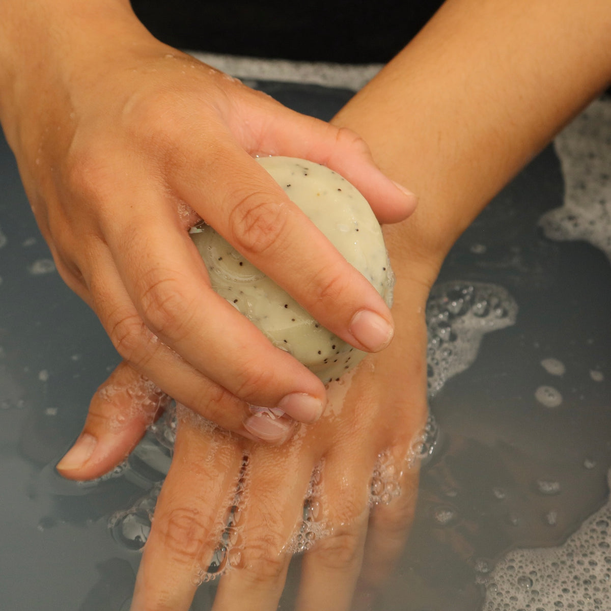 washing hands using kānuka soap